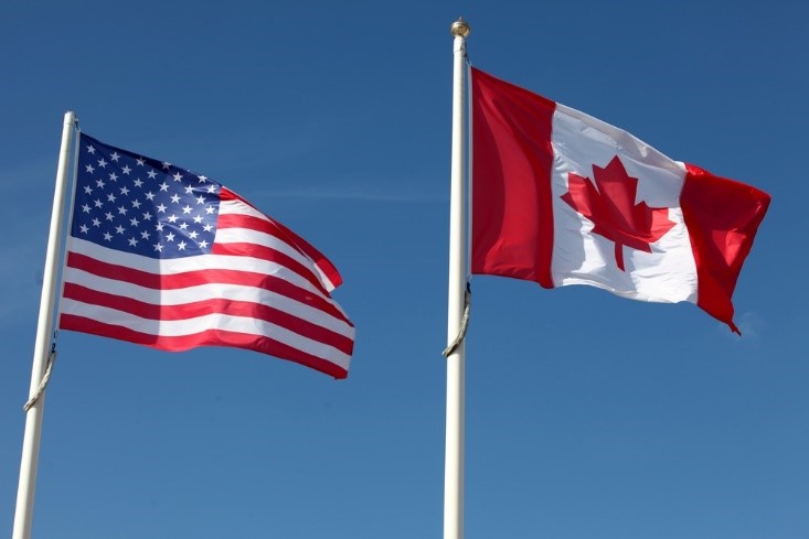 American and Canadian flags