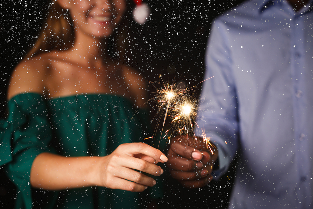 Two people with sparklers