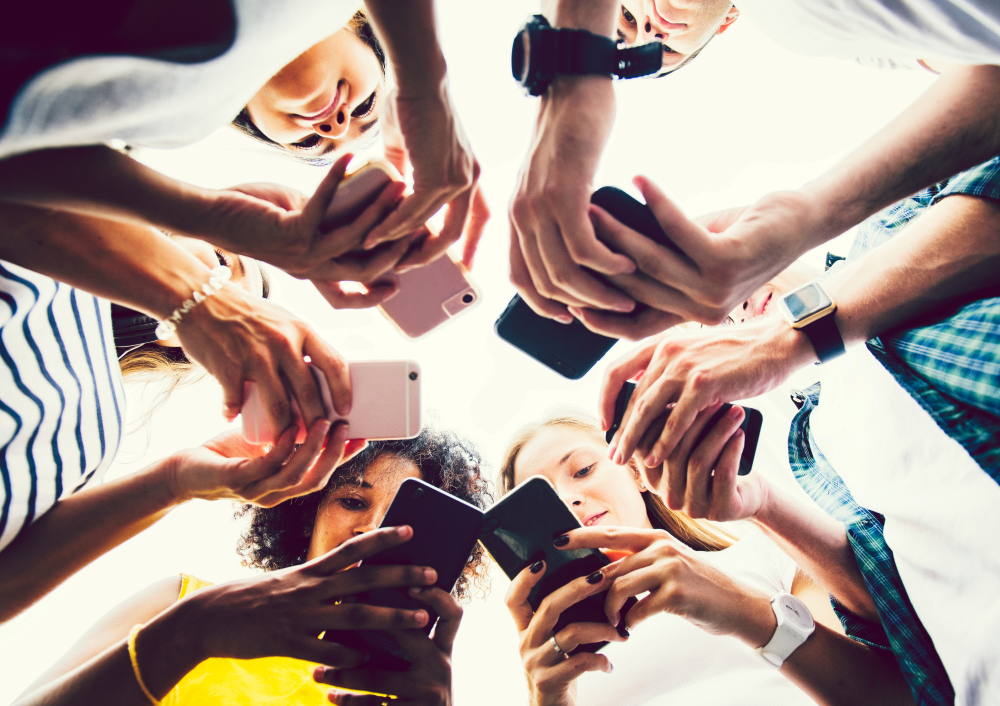 People completing online surveys on their smartphones