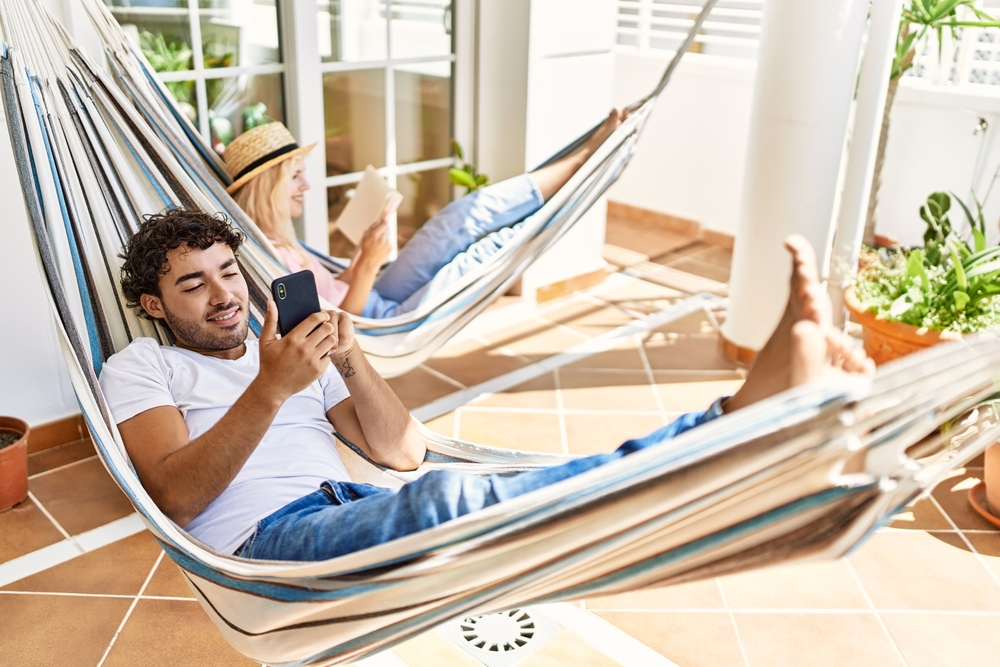 A couple in their hammocks