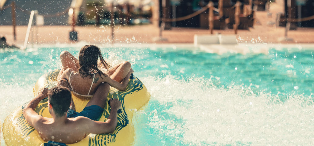 A couple having fun at the water park