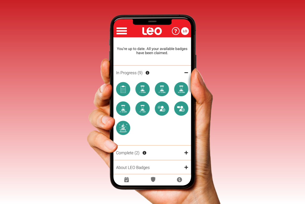 Hand holding a smartphone displaying the LEO platform badges screen, showcasing available achievements and rewards on a red gradient background.